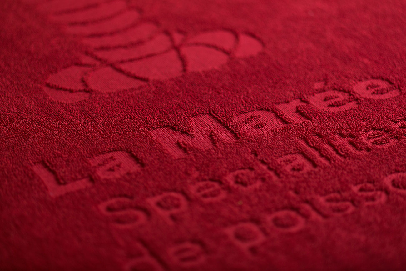 Relief-Jacquard-Einwebung